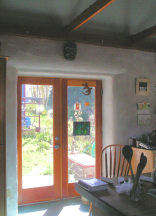 Partial view out through kitchen door